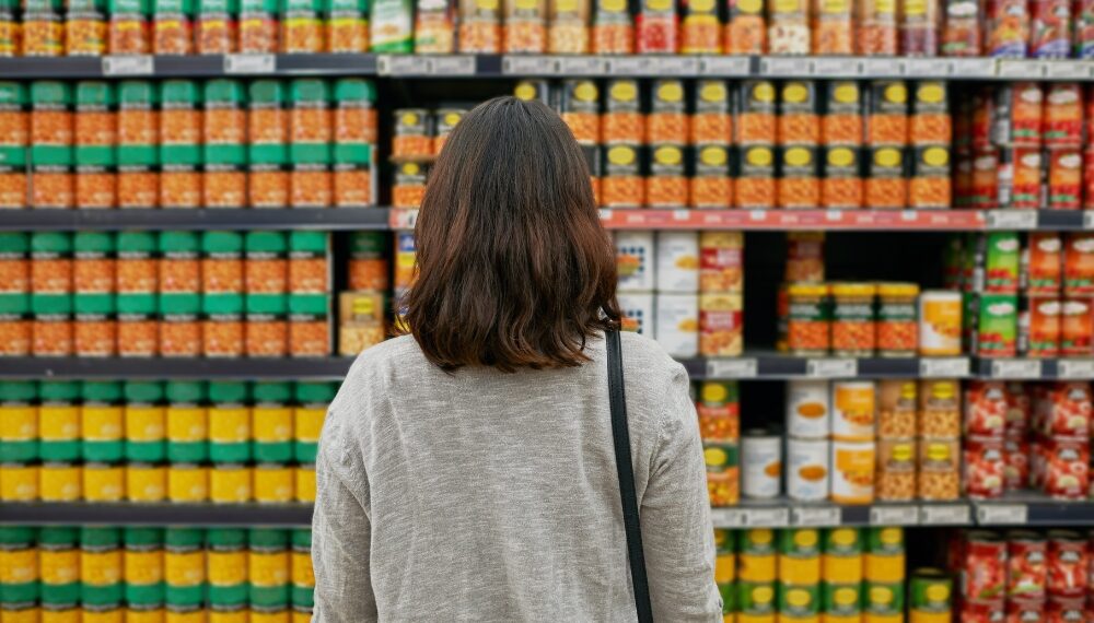 A female customer is looking at the brand's products to choose from at retail stores-Advantages of branding to customers