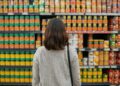 A female customer is looking at the brand's products to choose from at retail stores-Advantages of branding to customers