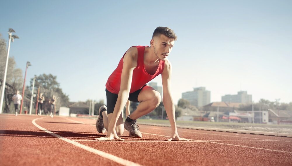Athlete preparing to run in the field: Athlete branding