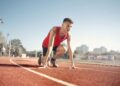 Athlete preparing to run in the field: Athlete branding