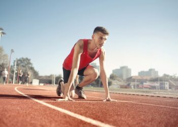 Athlete preparing to run in the field: Athlete branding