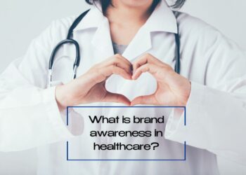 Doctor making heart with hand and below written text" What is brand awareness in healthcare?'