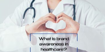 Doctor making heart with hand and below written text" What is brand awareness in healthcare?'