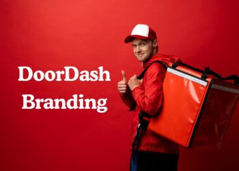 DoorDash branding written while delivery boy posing with delivery bag.